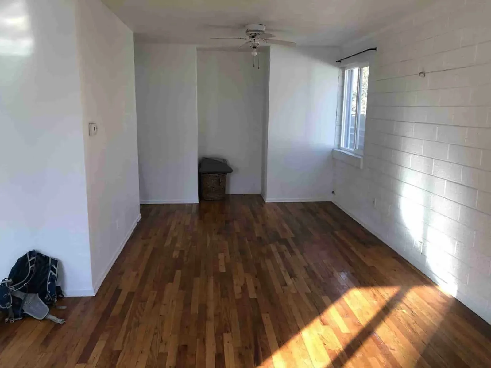 Completed room with finished drywall walls and ceiling